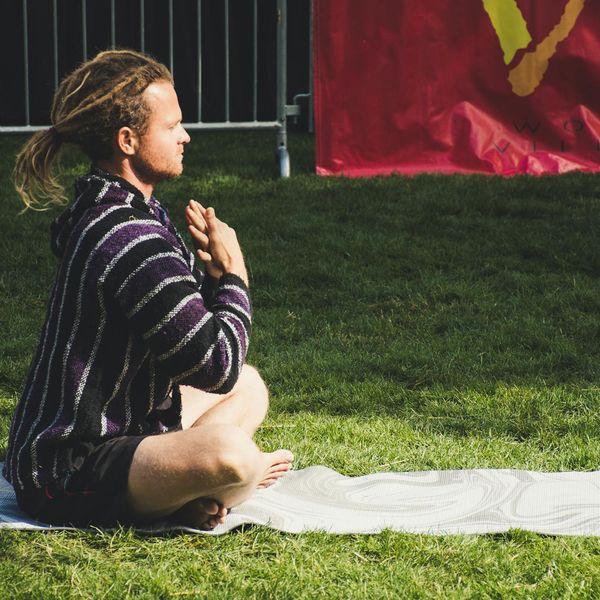 Person holding a balance pose with focus.